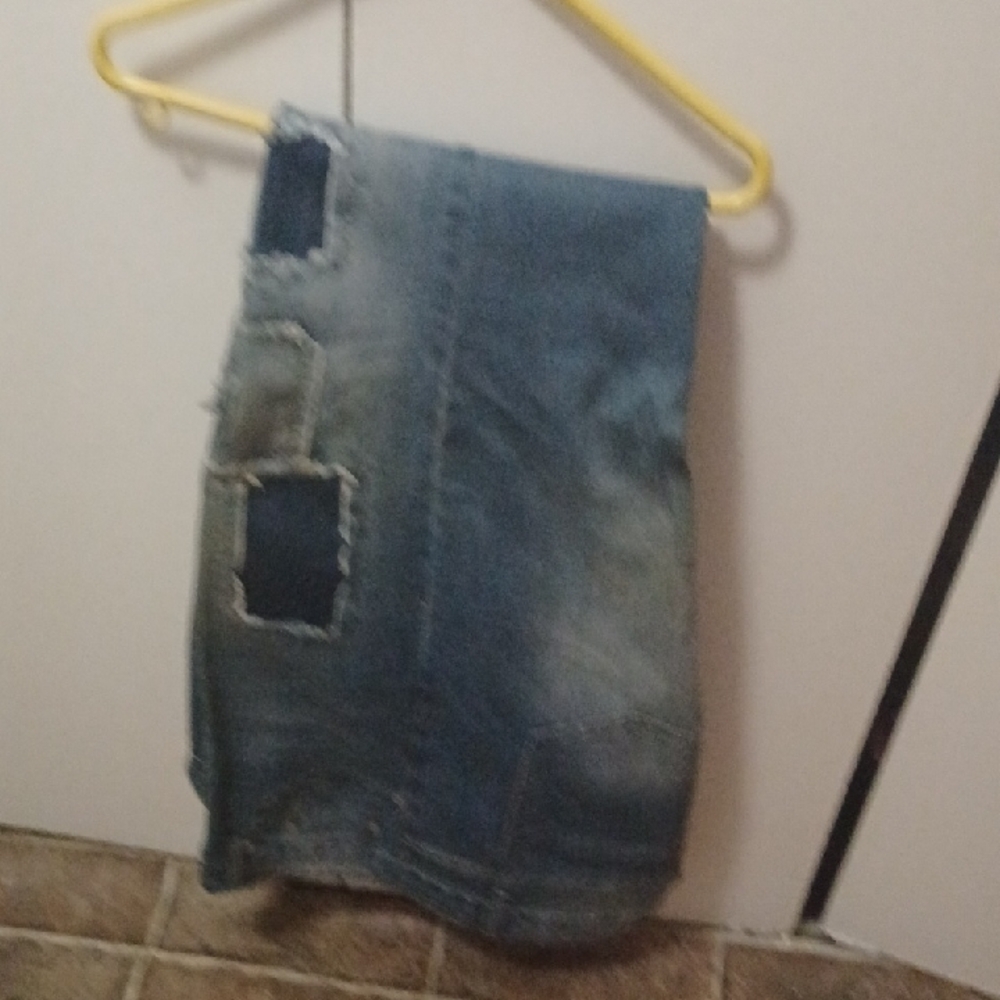 Distressed Blue Denim Jeans
